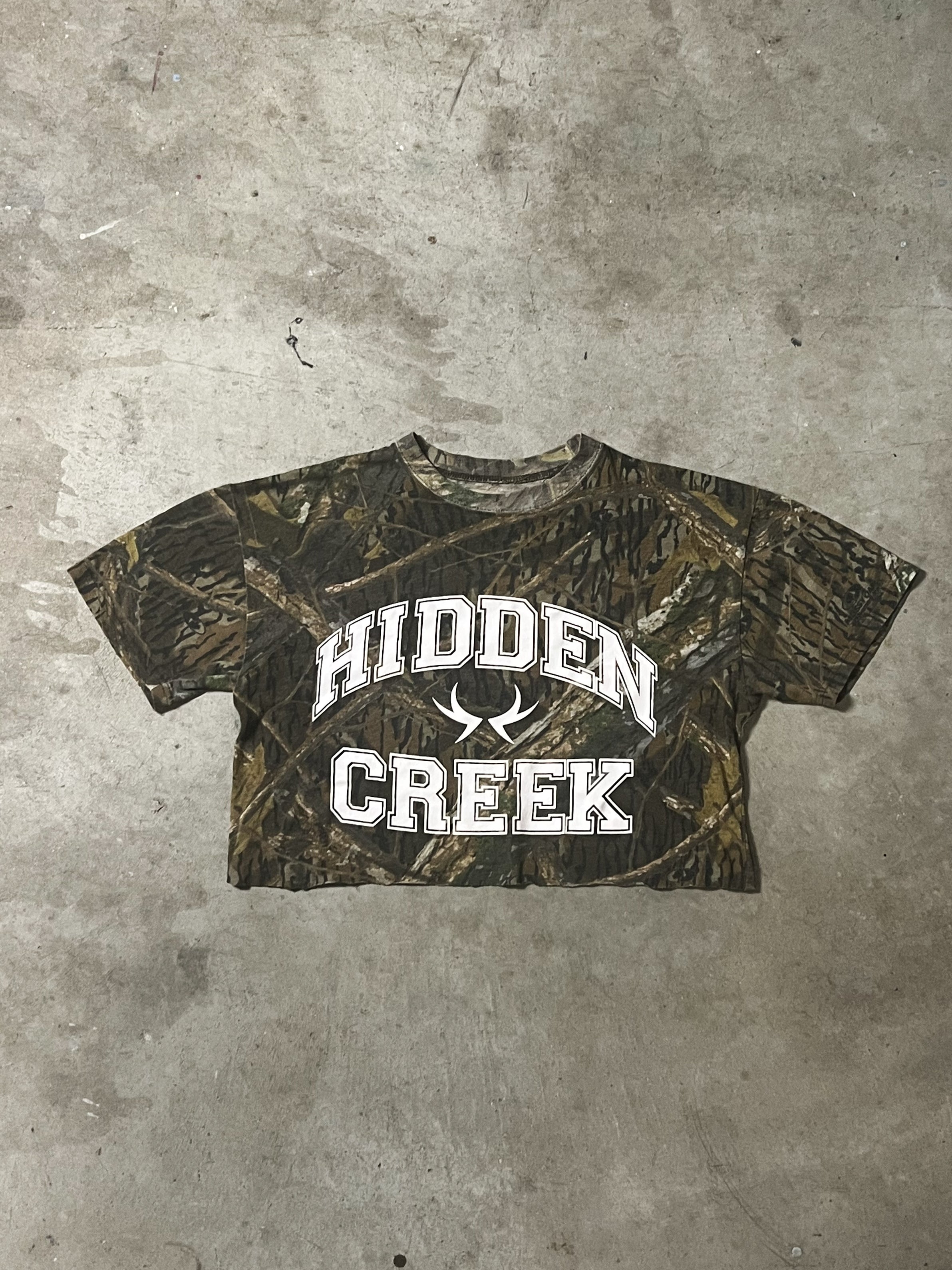 1 OF 1 REALTREE CROP TOP TEE WITH HIDDEN CREEK HAND PRINTED GRAPHIC | S